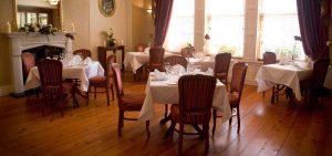 Restaurant setting with tables and chairs