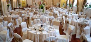 Tables and chairs set out for a wedding