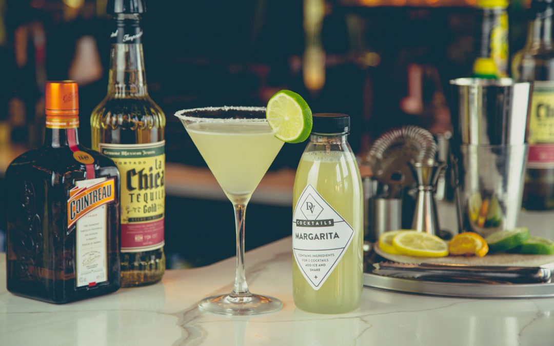 Lime cocktail with a lime wedge
