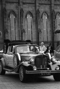old school car taking in black and white