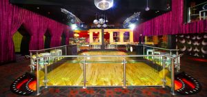 Dance floor with a disco ball and lighting