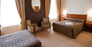 2 double beds across the room from each other