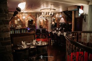 Restaurant setting with tables and chairs