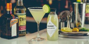 Lime cocktail with a lime wedge