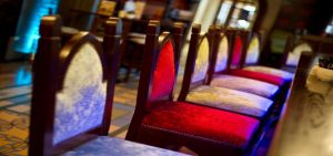 Red and silver chairs in a row