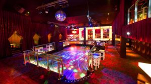 Dance floor with a disco ball and lighting