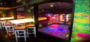Nightclub with dance floor and table and chairs